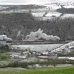 75029 banked by 63395 on the climb to Goathland at a snow dusted Esk Valley